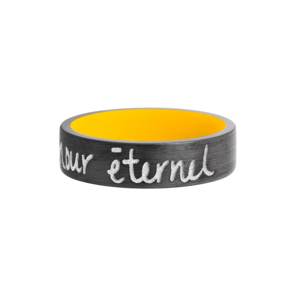 Zirconium 7mm flat band with slightly rounded edges and a laser-carved handwritten message with a yellow Cerakote sleeve Image 3 Toner Jewelers Overland Park, KS